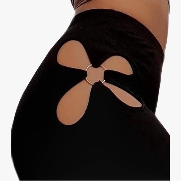 Pants - Black stretch yoga leggings daisy cutout flower gym pants rave festival ring xl